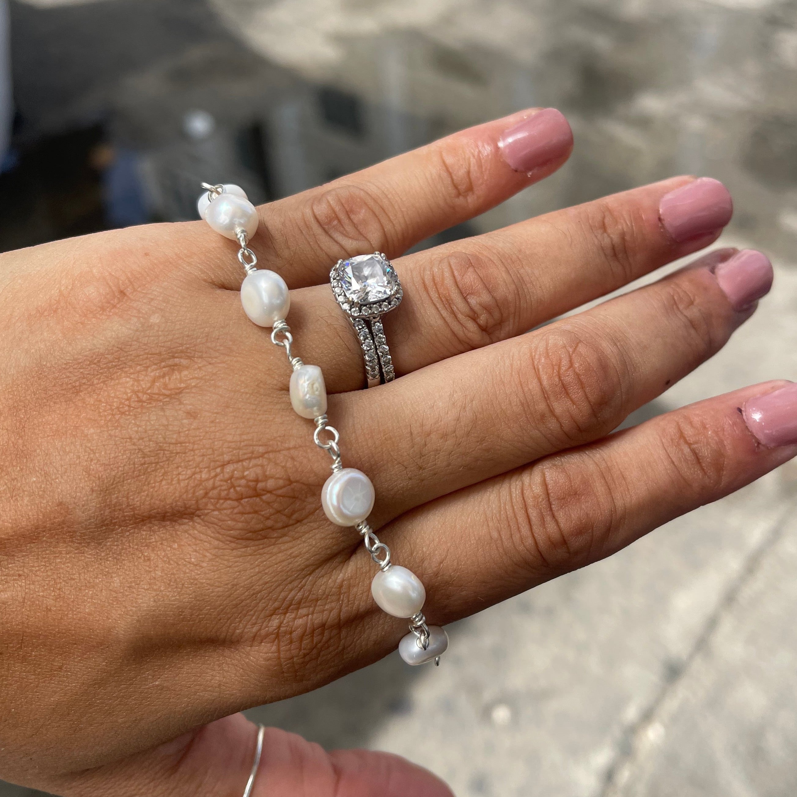 Handmade pearl bracelet with sterling silver chain. 
